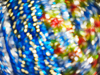 Multicoloured abstract soft-focused bright glittering and shiny festive bokeh background.