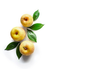 Fresh yellow apples on a white background. Autumn the composition. Isolated objects. Flat lay, top view. Minimal concept. Copy space. Mock-up