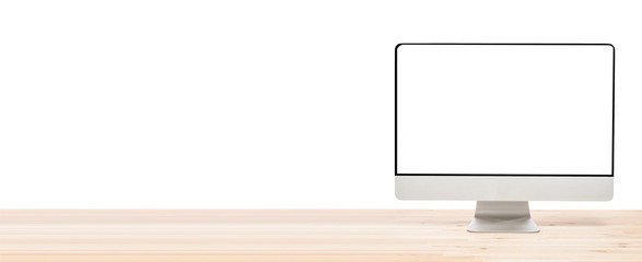 Conceptual workspace or business concept. Big computer monitor display with blank white screen on light wooden table. Isolated background. IT mockup.