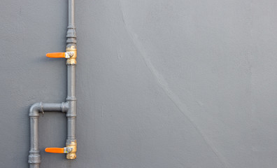 closeup water pipe install on brick wall background