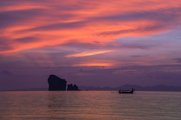 Krabi Thailand ocean sunset with boat