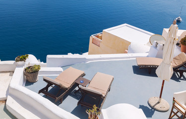 Sunny morning view of Santorini island. Famous Greek resort Oia, Greece, Europe. Traveling concept...