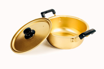 Gold metallic pot kitchenware on white background.