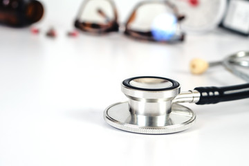 Stethoscope health tool on  table .Medical accessories with copy space.