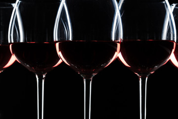 Glasses of wine in darkness