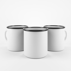 Three white enamel metal mugs on white background. Blank cup for branding. 3d rendering