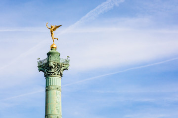 The Genius of Liberty golden statue, by french sculptor Auguste Dumont, atop the July Column in the...