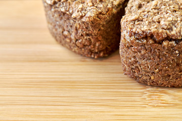 Closeup of rye wheat bread on a cutting board. homebaked bread. healthy food. copy space