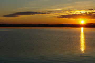 Obraz premium sunset on the river