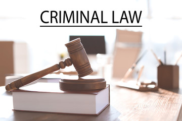 Gavel and book on table in lawyer's office