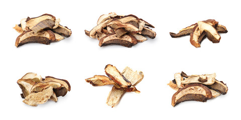 Set with slices of dried mushrooms on white background