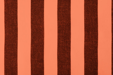 Fototapeta premium Texture of orange textile table napkin, closeup view