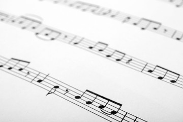 Fototapeta premium Sheet with music notes as background, closeup