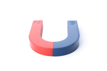 Red and blue horseshoe magnet isolated on white