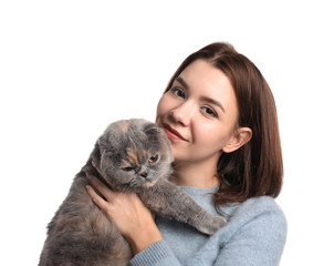 Portrait of young woman with her cute cat on white background