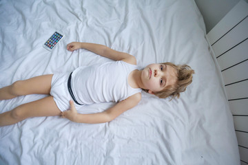 Five years old child sleeping with hat comfortably
