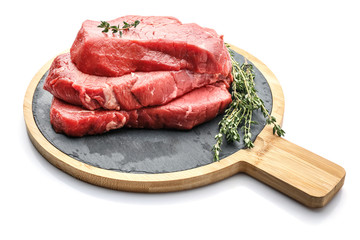 Wooden board with tasty raw meat on white background