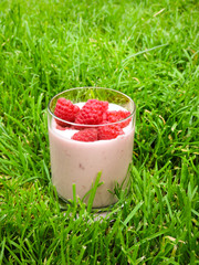 Fresh Raspberries background. Strawberry. Food background.Copy space. Top view, healthy food for breakfast. Eco, organic summer diet food. Ripe Raspberries from garden in a mug .Summer Raspberries . 