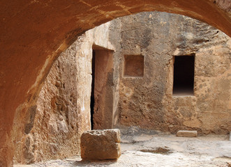 view of underground arch and doorway at the tomb of the kings in paphos cyprus forming and ancient...