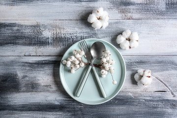 Christmas table setting on color wooden background
