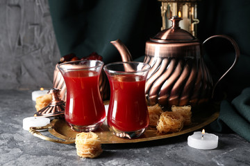 Composition with tasty Turkish tea on table