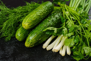 cucumbers  on black background