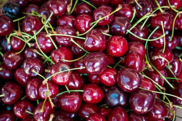red cherry background. Red ripe delicious cherries