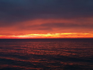 Beautiful lonely beach with a bright red sunset in Khao Lak in Thailand, Asia