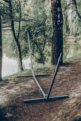 Hammock construction, metal support bars for hammock hanging close-up, instruction manual concept