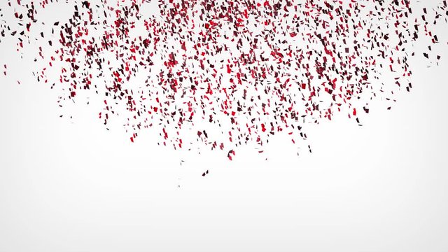 Red confetti explosion falling down on white background. 4K.