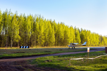 Light passenger planes parked before departure at private airport in Kronshtadt, St.Petersburg,...