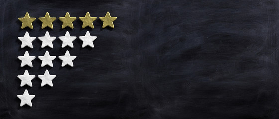 Five golden stars isolated on black background, 3d illustration