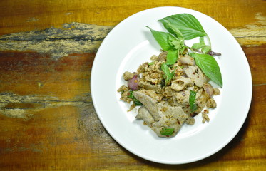 spicy minced pork and liver Thai salad on dish