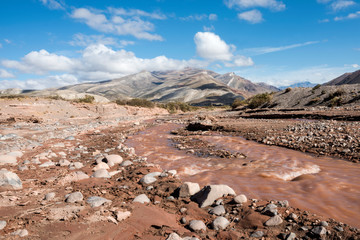 Layered sedimentary rocks in the colorful valley of the Rio Grande (Spanish for 