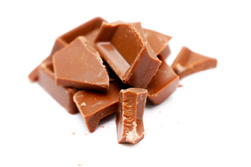 pieces of a milk chocolate on white background