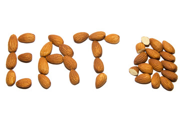Close-up of almonds. A word made up of nuts. Screen saver. On white background. Isolated.