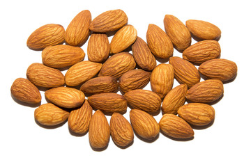 Close-up of almonds. Screen saver. On white background. Isolated.