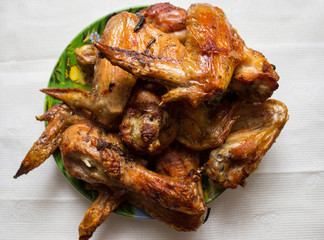 roasted chicken on plate isolated on white