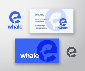 Whale Abstract Vector Logo and Business Card Template. Whale Silhouette Incorporated in the Letter E Concept with Modern Typography. Premium Stationary Realistic Mock Up.