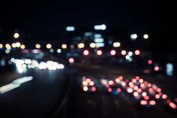 Abstract blurred background of city light. Out of focus traffic light background.