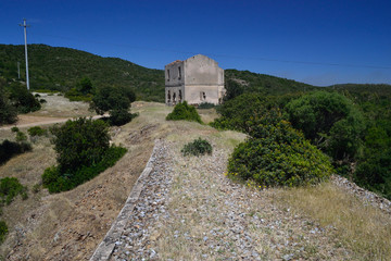 Fototapeta na wymiar Linea ferroviara abbandonata del Sulcis