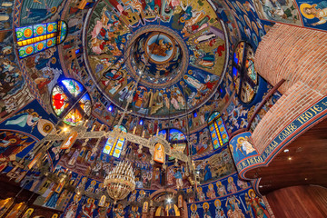 Fototapeta na wymiar Belgrade, Serbia - May 23, 2018: The cupola decorated with frescoes of Orthodox church St. Basil of Ostrog (Serbian: Crkva Svetog Vasilija Ostroškog) in Belgrade, Serbia