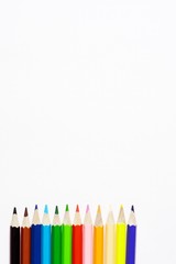 Back to school concept - school office supplies. Top view of wooden office table with colorful supplies and copy space. Design and art concept