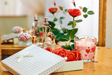 white box with roses and candles