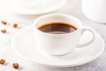 Concept of morning coffee, coffee break on a light background.