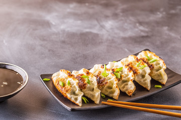 gyoza or dumplings snack with soy sauce