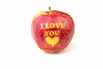 Apple with text I LOVE YOU on white background