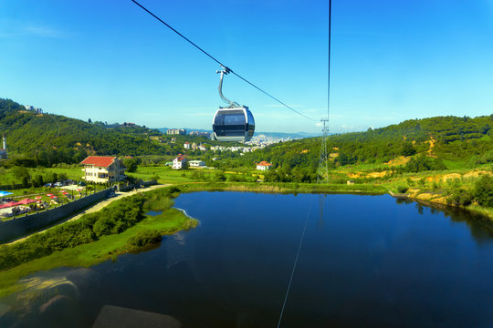 View of the Dajti Express cable car and lake in Tirana, Albania.