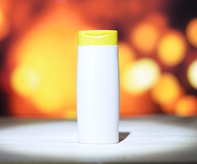  bottle with shampoo on blurry background