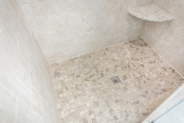 Fototapeta na wymiar Modern New Construction Master Bathroom Shower Tiles